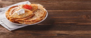 Russian pancakes with red caviar